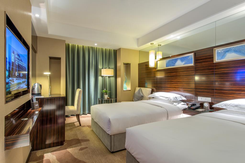 Longda Hotel Csangcsun Szoba fotó